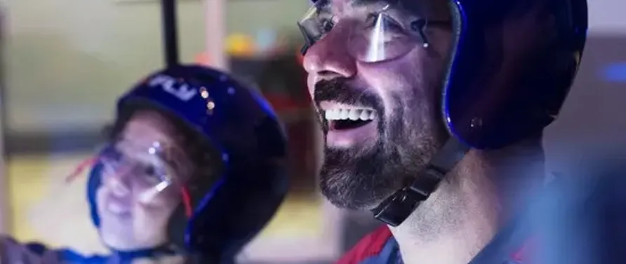 Group celebrating at iFLY after flights